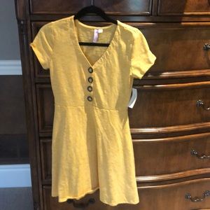 Mustard short sleeve cotton dress from Francesca’s .